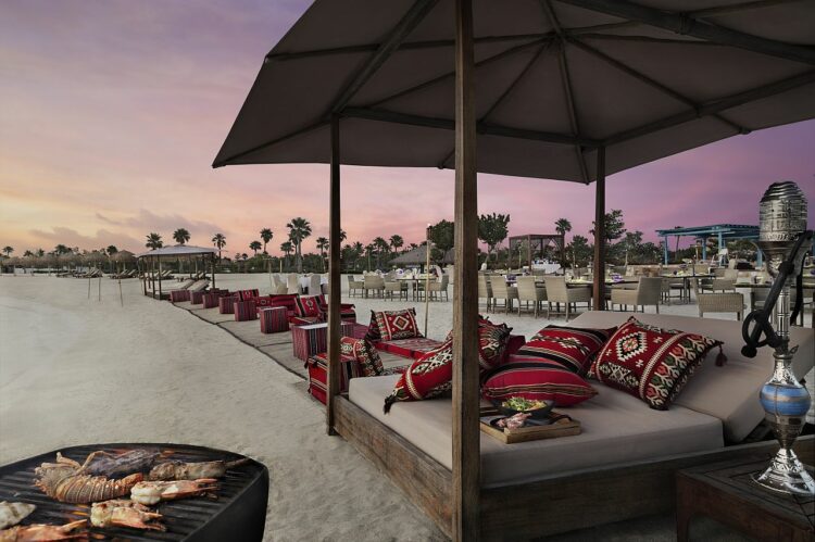 Banana Island Resort Doha By Anantara Restaurant Q Lounge And Restaurant Barbecue Set Up Beach Area Sunset