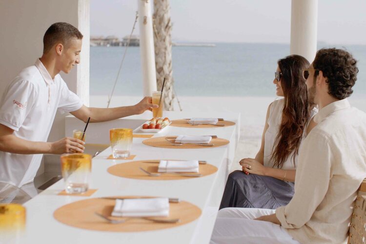 Banana Island Resort Doha By Anantara Restaurant Tanzerin Bar With Couple Served With Drinks