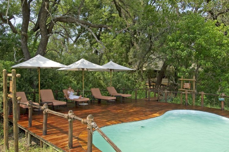 Africa; Botswana; Okavango Delta; Sanctuary Stanley's Camp; Guest At Pool